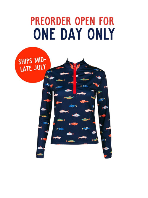 PREORDER: Long Sleeve Rashguard in Harbor by Kitty and Vibe. Features a colorful fish print, red zipper, and SPF 50+ protection. Preorder open for one day only—ships mid-late July!.
