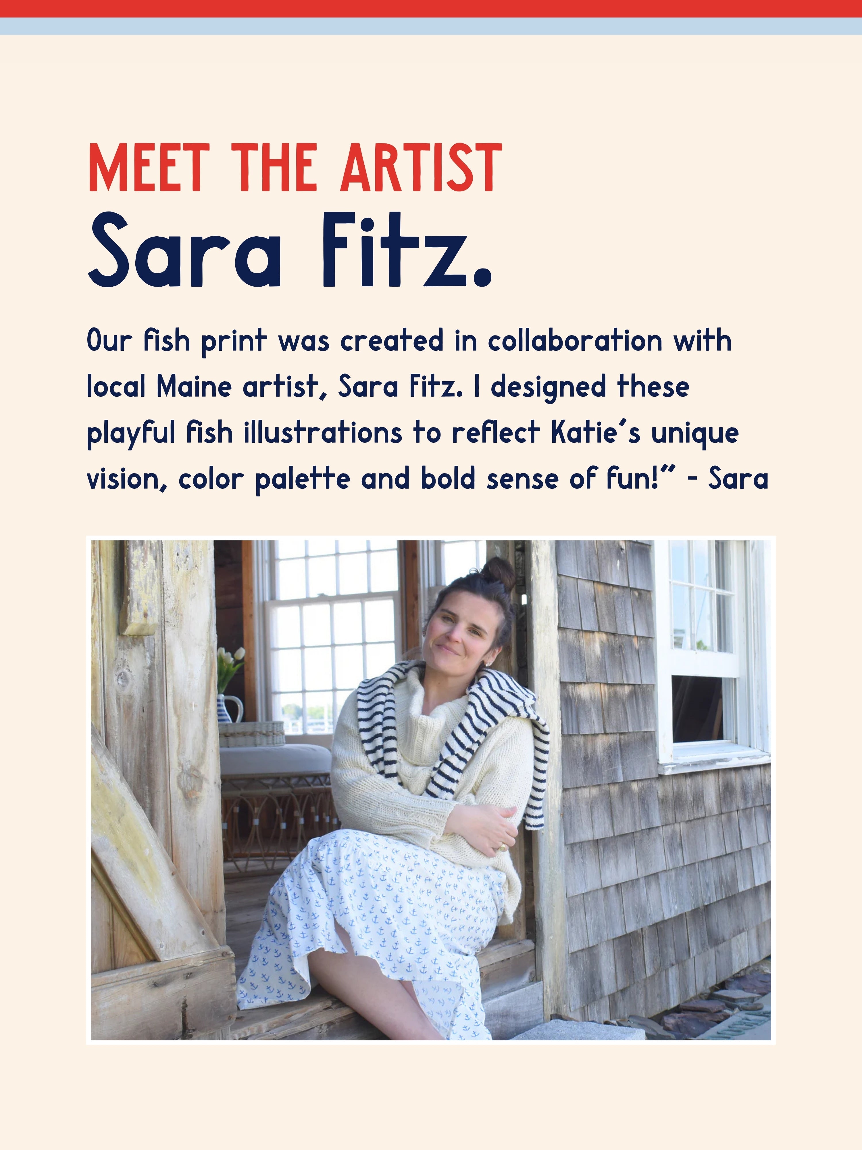 A woman with dark hair in a bun, wearing a cream sweater and a striped scarf resembling the Kitty and Vibe Long Sleeve Rashguard in Harbor, sits on a rustic porch, smiling. Text above introduces Sara Fitz as a local Maine artist.
