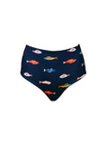 Kitty and Vibe's High Waisted Full Coverage Bottoms in Harbor feature a fun, colorful fish print on navy blue. These stylish high-rise bikini bottoms offer full coverage and comfort for a flattering beach look.