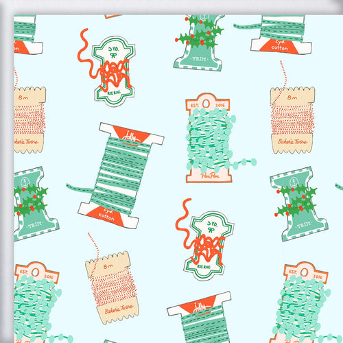 Holiday Trimmings Gift Wrap featuring a pattern of bakers twine, ribbon, pom-poms, and ric rac trim on a light blue eco-friendly paper background.