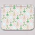 Large Holiday Cross Stitch Tray by Sara Fitz, a rectangular melamine coated tray featuring a repeating cross-stitch pattern of gingerbread men, Christmas trees, snowflakes, and holly sprigs framed by red dashed diamonds.