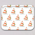 Large Holiday Sailboat Tray: a rectangular melamine coated tray featuring a repeating pattern of sailboats with red-and-white striped sails, decorated with Christmas lights and a wreath, with the text 12-25 on each sail.