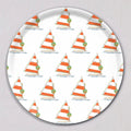 Large Holiday Sailboat Tray, Round, featuring a repeating pattern of sailboats with orange and white striped sails, decorated with Christmas wreaths and string lights on a melamine coated birch wood surface.