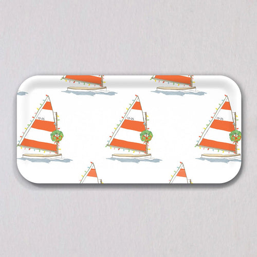Small Holiday Sailboat Tray: a rectangular birch wood tray decorated with a repeating pattern of sailboats featuring orange and white striped sails, string lights, and Christmas wreaths.