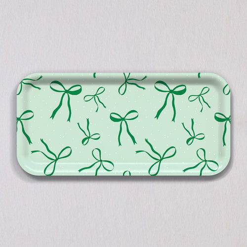 Small Green Bows Tray, a rectangular light green birch wood tray featuring a repeating pattern of dark green bows.