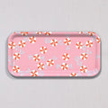 Small Peppermint Candy Tray, a rectangular pink melamine-coated birch wood tray with a repeating pattern of red and white peppermint candies.