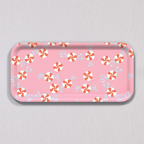 Small Peppermint Candy Tray, a rectangular pink melamine-coated birch wood tray with a repeating pattern of red and white peppermint candies.