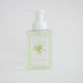 Foaming Soap Tulip Blooms by Sara Fitz comes in a clear plastic pump bottle with a front label depicting white tulips and green stems. Non-toxic and gentle, it's ideal for everyday use.