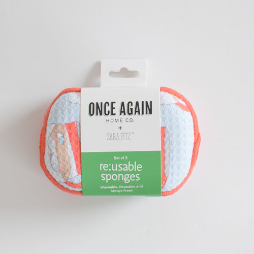 A set of three Re:usable Sponge, Santa Mug sponges held together by a paper label.
