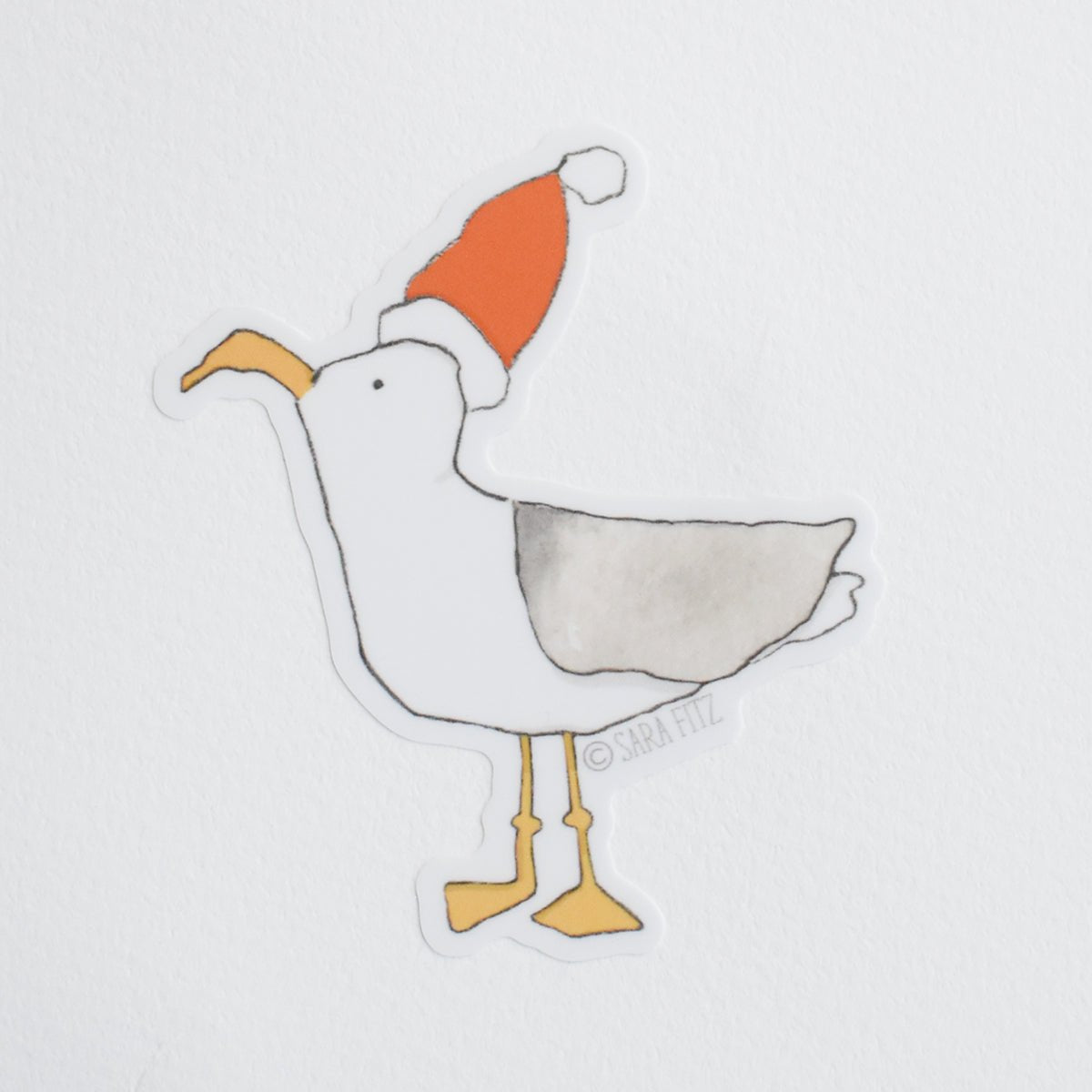 Watercolor illustration of a Santa Gull Sticker featuring a seagull wearing a red and white Santa hat.