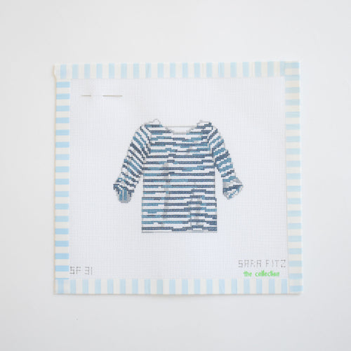 The Sara Fitz Striped Shirt Needlepoint is a stitch-painted 18 mesh canvas showing a blue and white striped long-sleeve shirt on a white background with a light blue striped border.