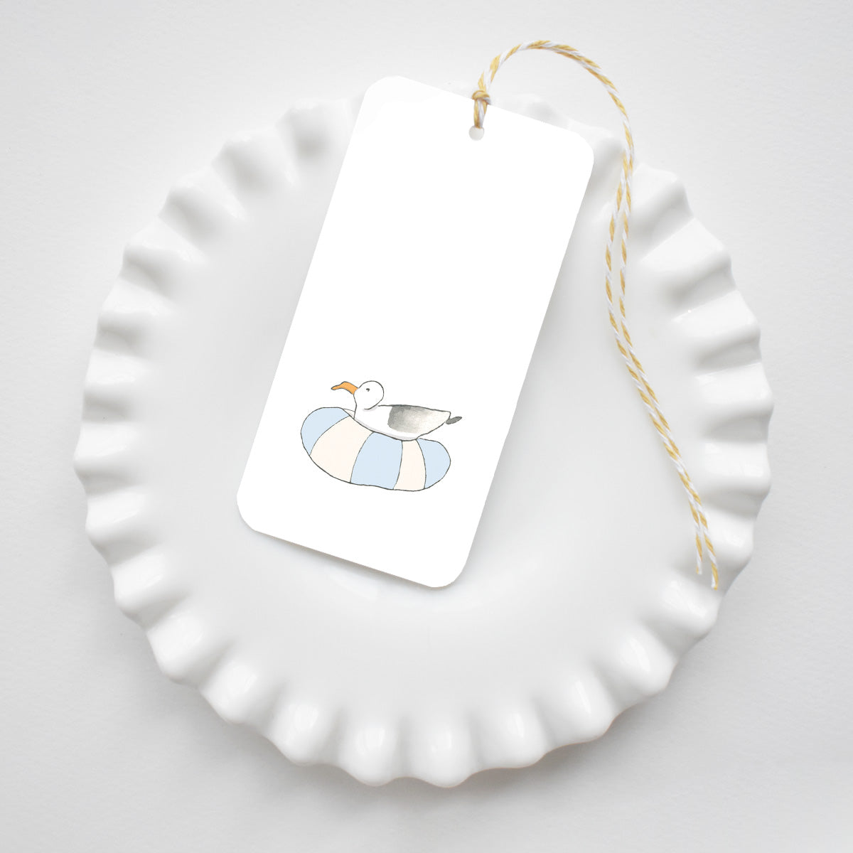 Floating Gull Tags by Sara Fitz