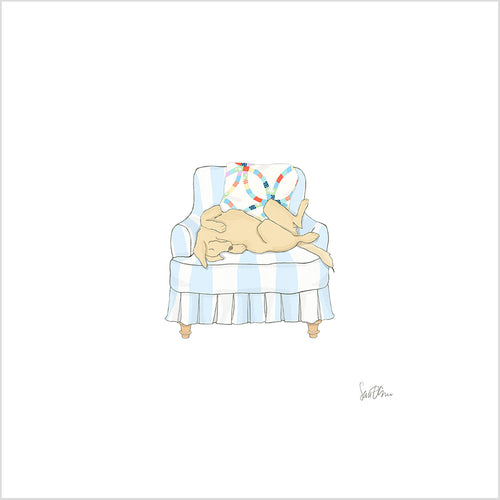 The Pup in Chair Art Print by Sara Fitz features a tan dog napping on a light blue and white striped armchair with a colorful pillow, set against a plain white background—perfect for custom framing as an archival-quality decor piece.