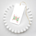 The Sara Fitz Butterfly Tags feature a pastel butterfly design on white cardstock, finished with yellow and white baker’s twine. These charming gift tags come ready to use and look lovely displayed on a scalloped-edge plate.